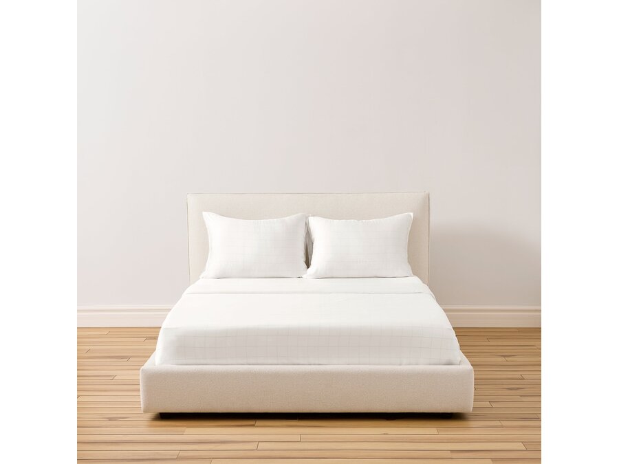 Buffy Breeze eucalyptus sheet set made up on a bed